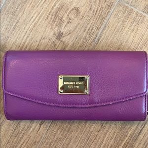 Purple Michael Kors wallet with gold hardware !